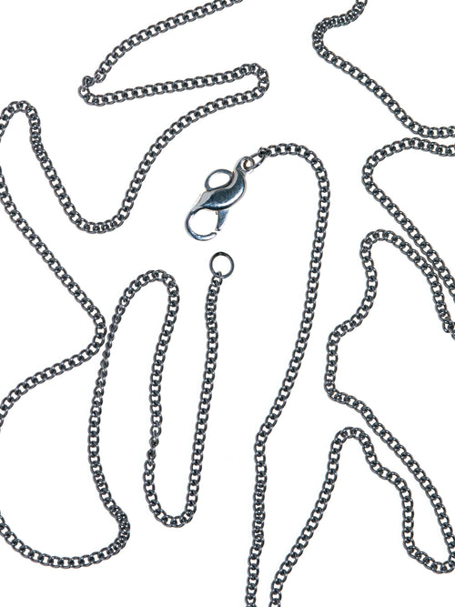 A Life Form Necklace in Silver worn around neck, detail view |Color:Silver