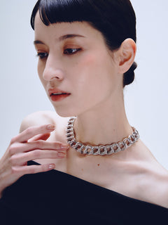 Languid Loop Necklace in Silver worn around neck, three-quarter view |Color:Silver