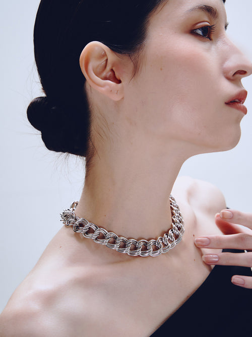 Languid Loop Necklace in Silver worn around neck, alternate view |Color:Silver