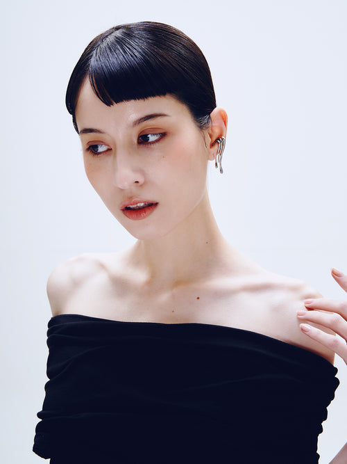 Languor Ear Cuff in Silver worn on ear, portrait view |Color:Silver