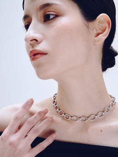Lull Necklace in Silver worn around neck, close-up view |Color:Silver