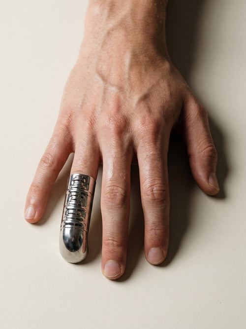 Ratite Nail Ring in Silver worn on hand, top view |Color:Silver