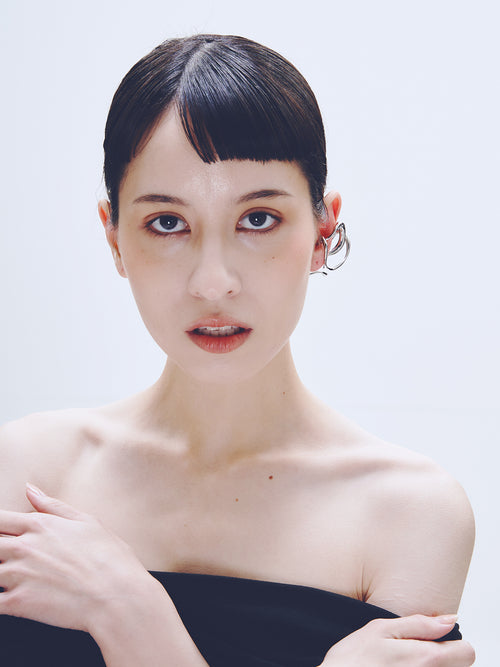 Tedium Ear Cuff in Silver worn on ear, front portrait view |Color:Silver