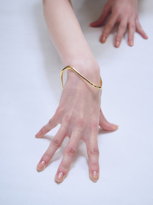 Wave Bracelet in Gold worn on hand |Color:Gold