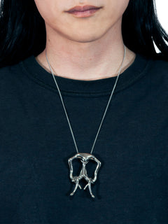 A Life Form Necklace in Silver worn around neck, front view |Color:Silver