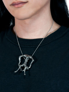 A Life Form Necklace in Silver worn around neck, angled view |Color:Silver