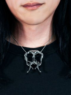 A Life Form Necklace in Silver worn around neck, close-up view |Color:Silver