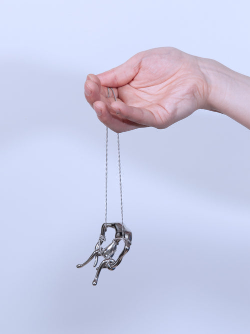 A Life Form Necklace in Silver worn around neck, alternate close-up view |Color:Silver