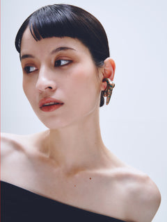 Decay Drift Ear Cuff in Copper worn on ear, portrait view |Color:Copper
