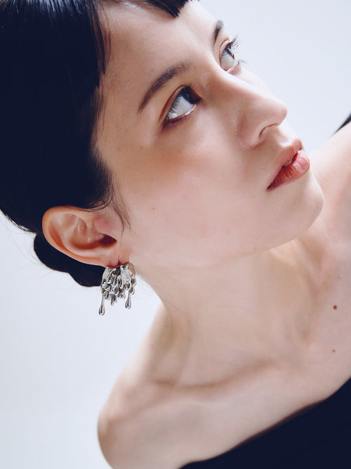 Drop Earring in Silver worn on ear, side view |Color:Silver