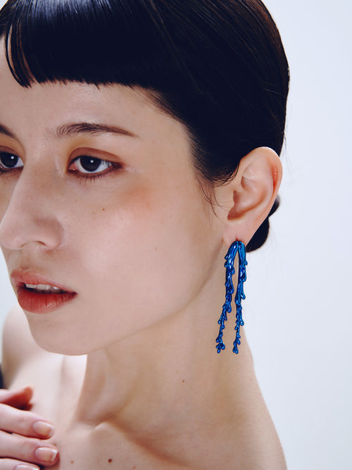 Drop Stand Earring in Blue worn on ear, front three-quarter view |Color:Blue