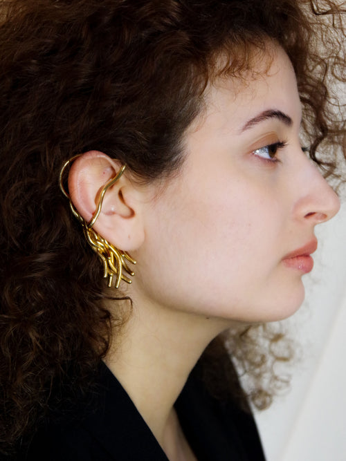 Gal Cuff in Gold worn on right ear, portrait view |Color:Gold