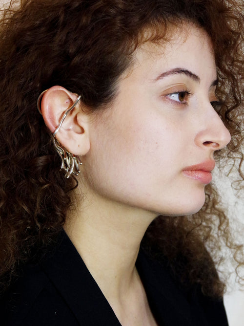 Gal Cuff in Silver worn on right ear, portrait view |Color:Silver