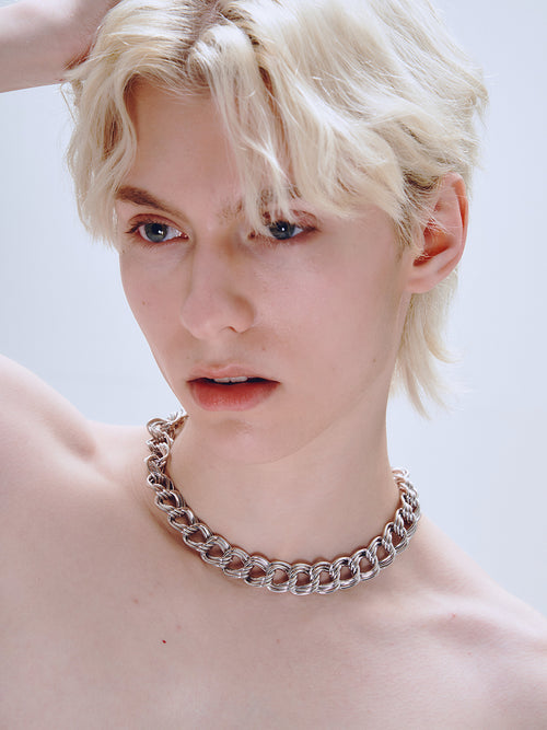 Languid Loop Necklace in Silver worn around neck, alternate close-up view |Color:Silver
