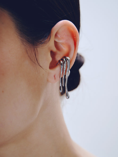 Languor Ear Cuff in Silver worn on ear, close-up view |Color:Silver