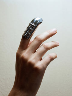 Ratite Nail Ring in Silver worn on finger, side view |Color:Silver
