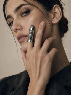 Ratite Nail Ring in Silver worn on hand near face |Color:Silver