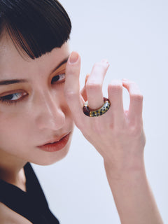 Sable Ring in Multicolor worn on finger near face |Color:Multicolor