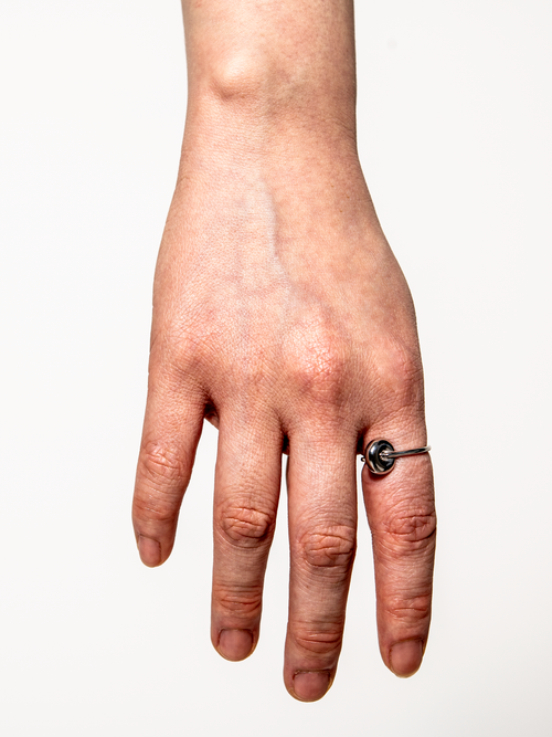 Solitude Ring in Silver worn on finger |Color:Silver