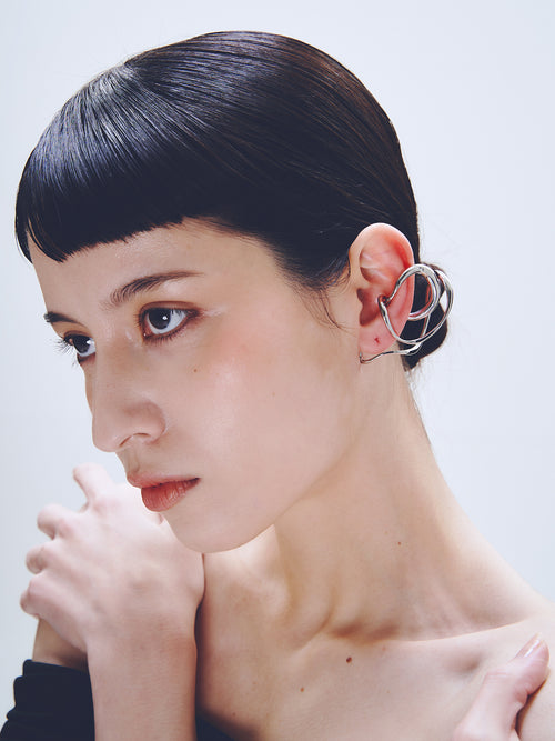 Tedium Ear Cuff in Silver worn on ear, portrait view |Color:Silver