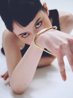 Wave Bracelet in Gold worn on arm, portrait view |Color:Gold