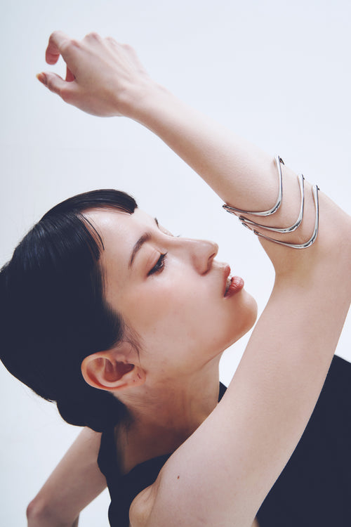 Wave Bracelet in Silver worn on arm, portrait view |Color:Silver