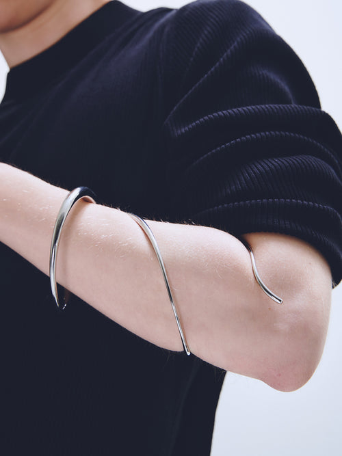 Writhe Bracelet in Silver worn on arm, alternate side view |Color:Silver